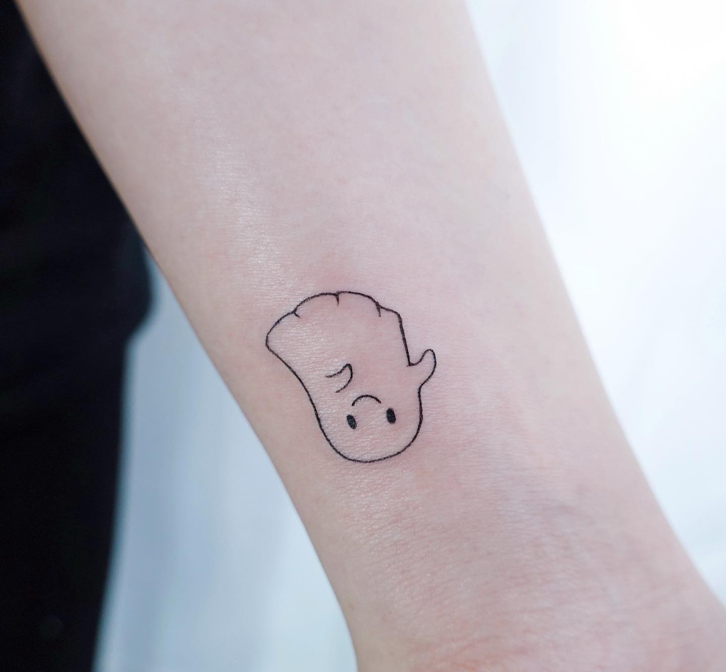 Tatuaje de muñeca de fantasma.