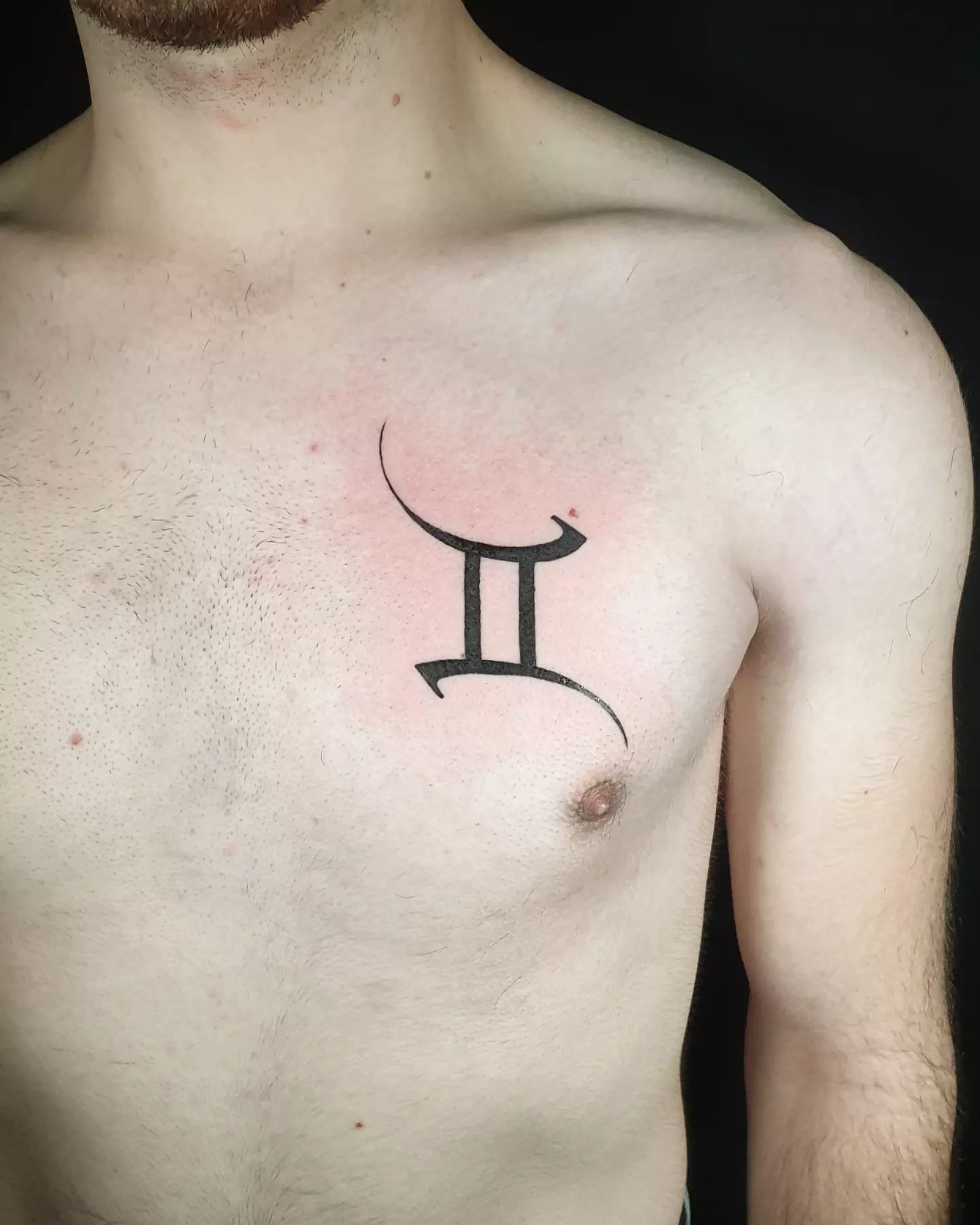 Tatuaje de Géminis para hombres.