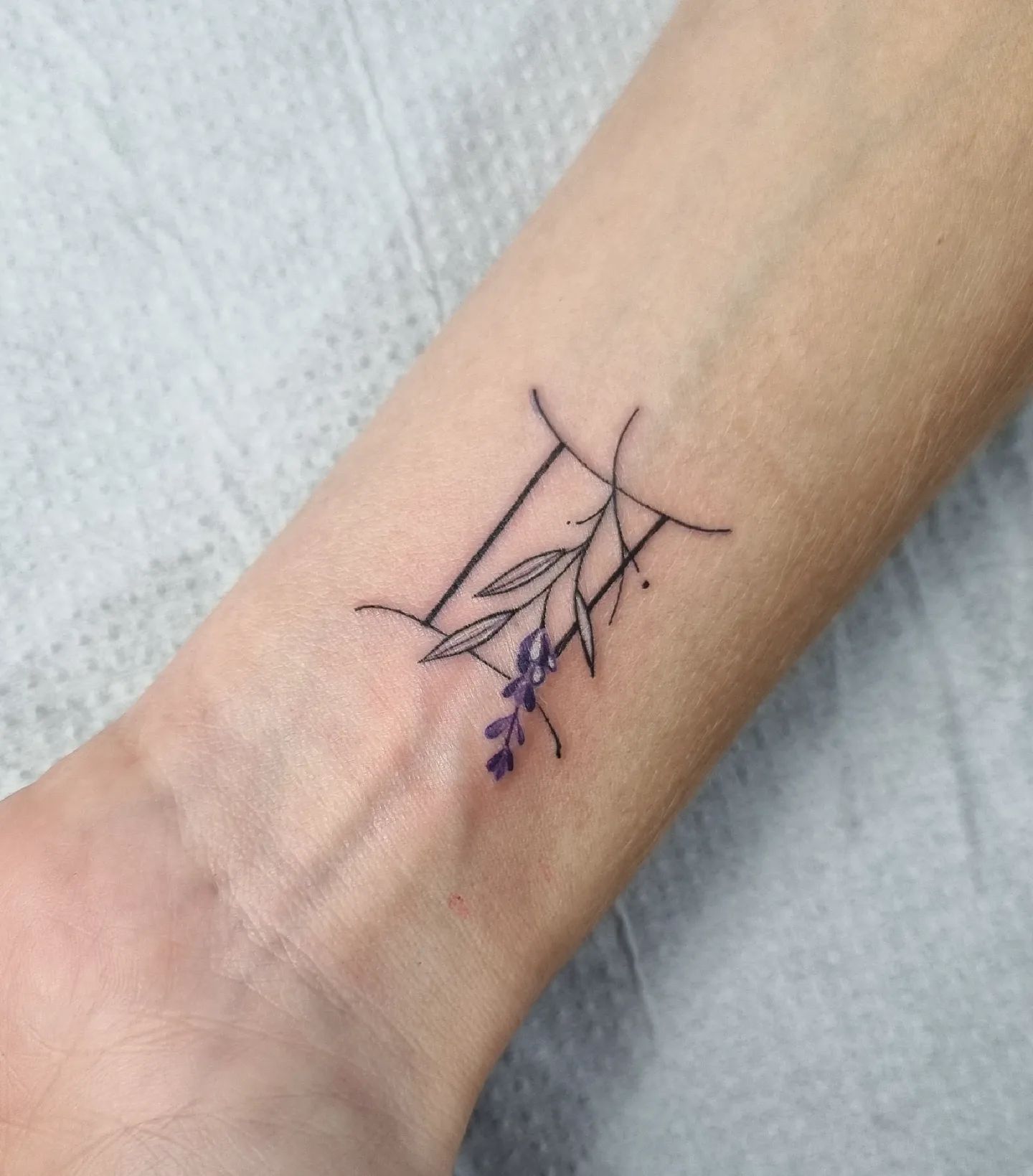 Tatuaje de Géminis sobre el hombro
