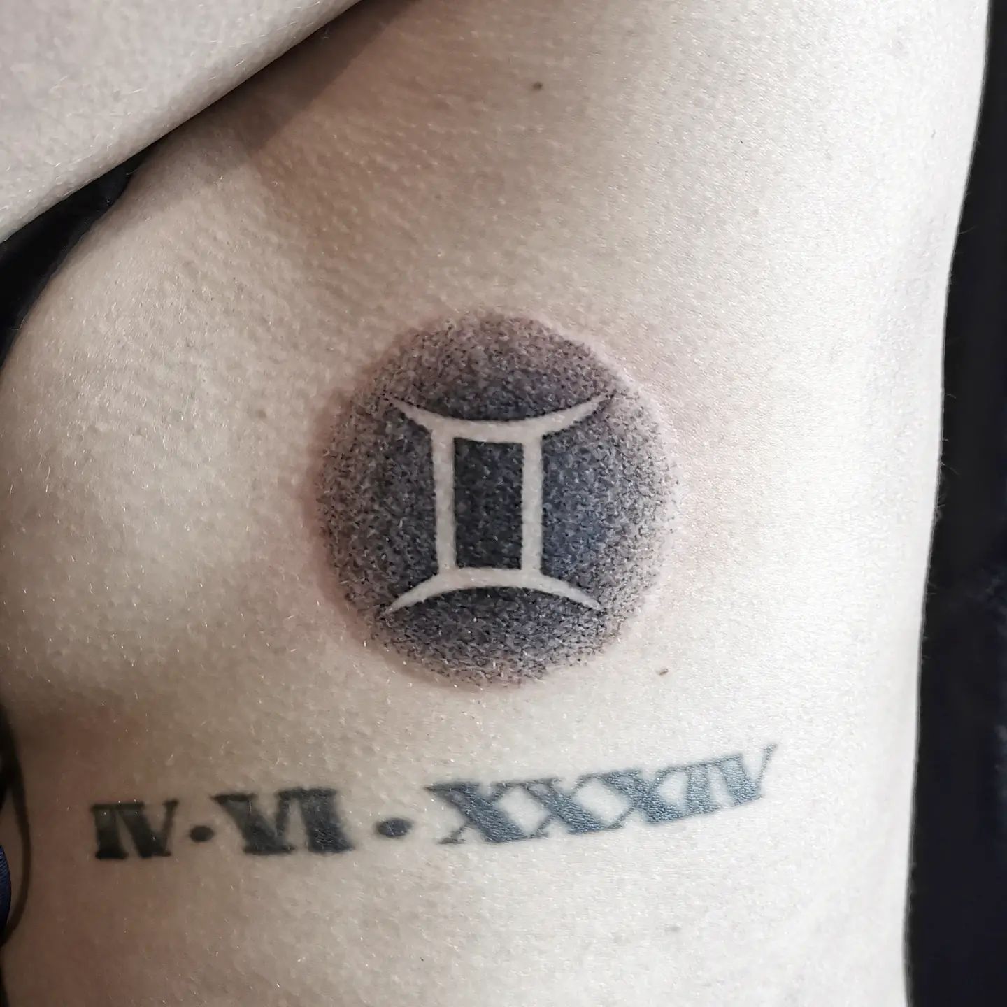 Tatuaje de la palabra Géminis
