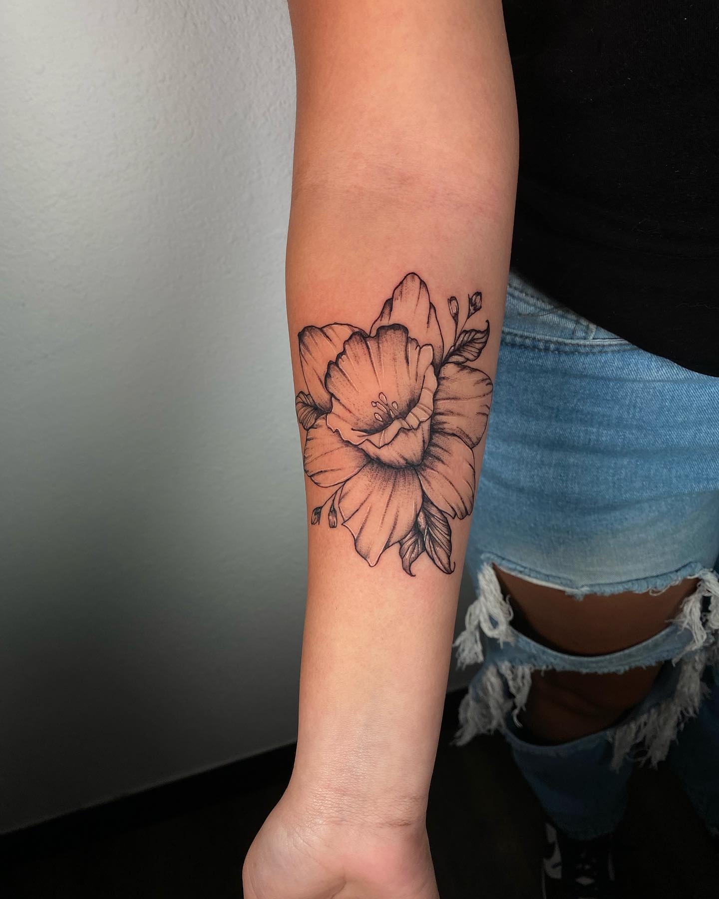 Tatuaje de Narciso en Media Manga