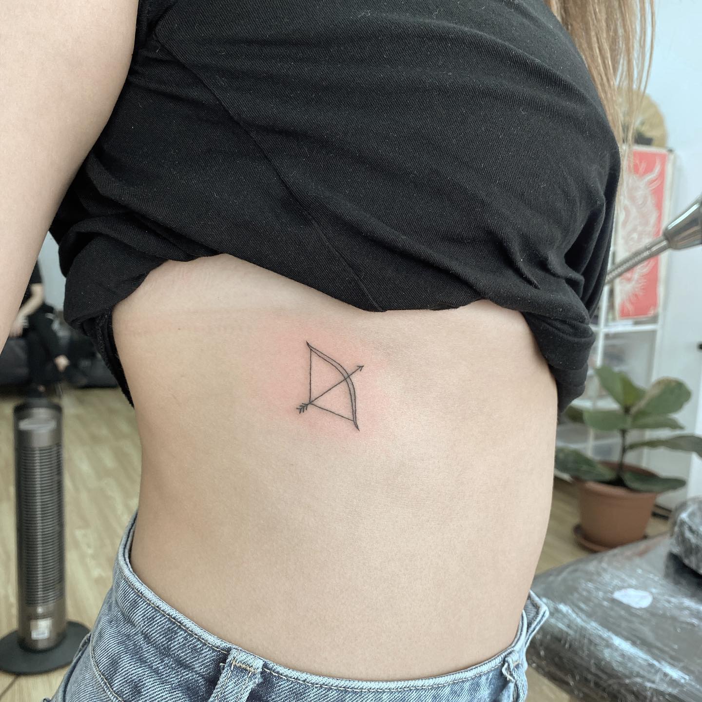 El tatuaje del Sol y la Luna.