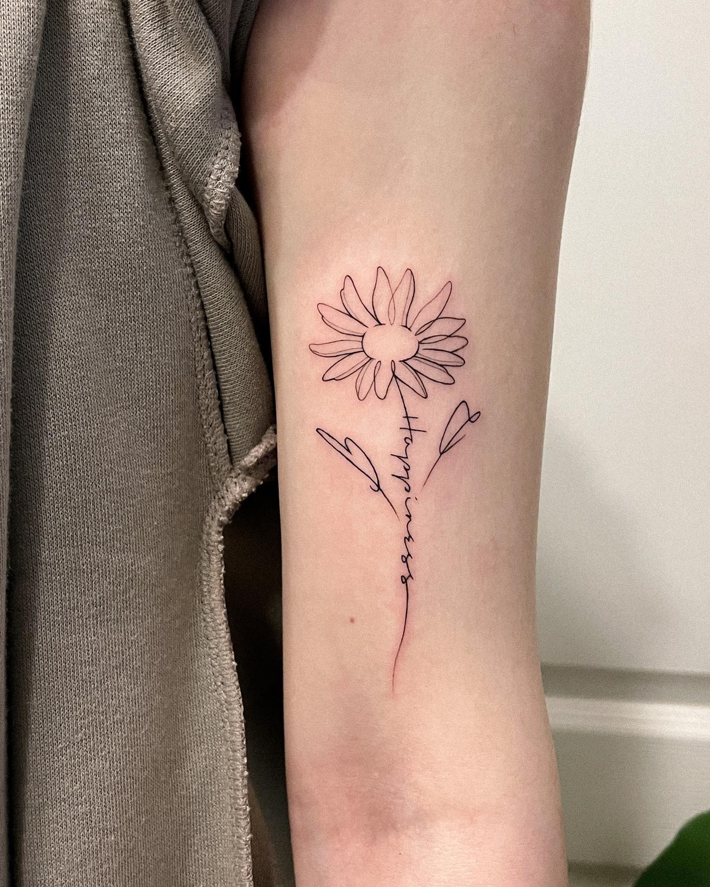 Nombre inspirado en tatuaje de margarita.