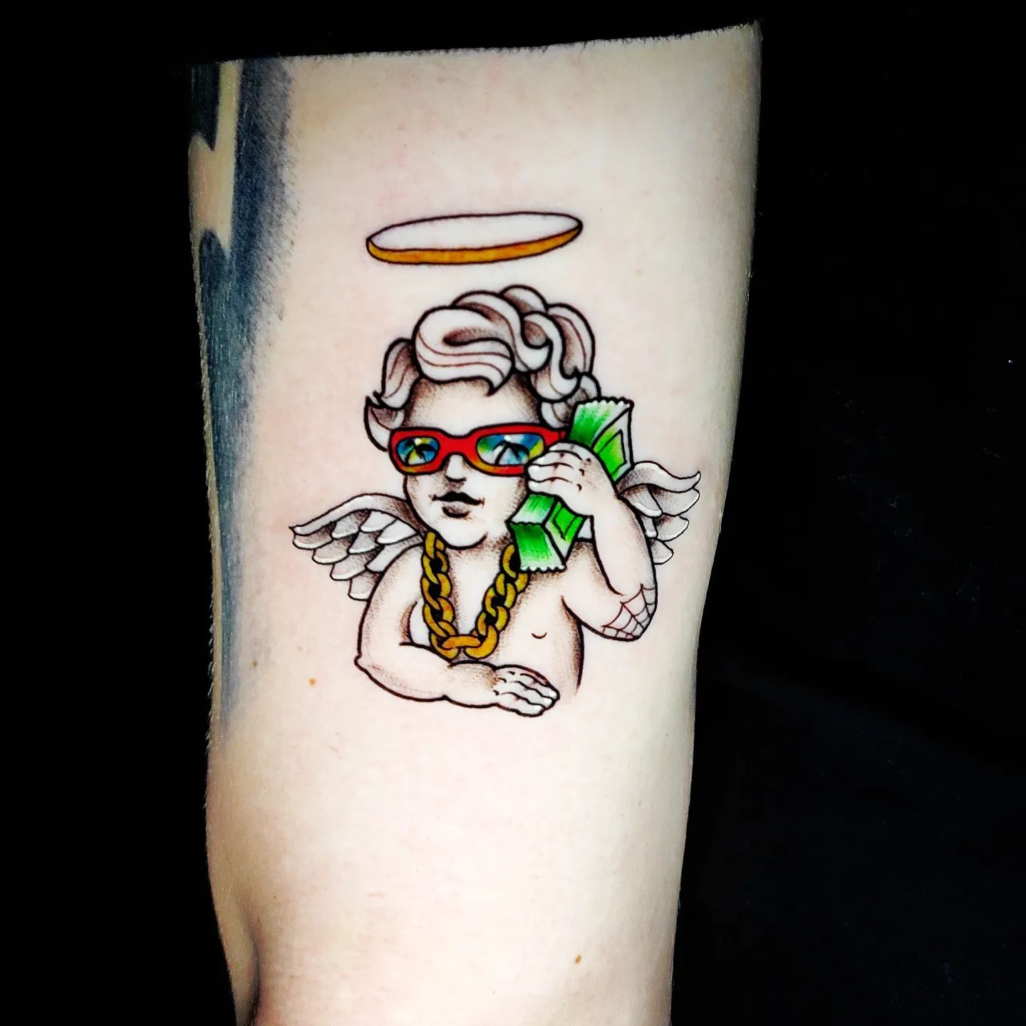 Ángel Dinero Tatuaje