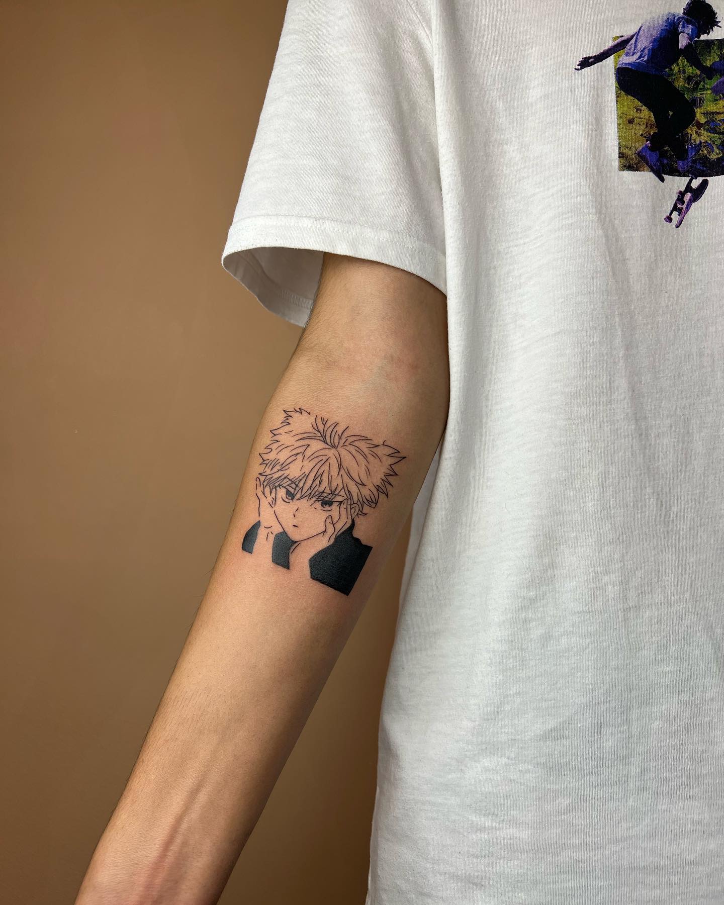 Tatuaje del brazo genial de Killua.