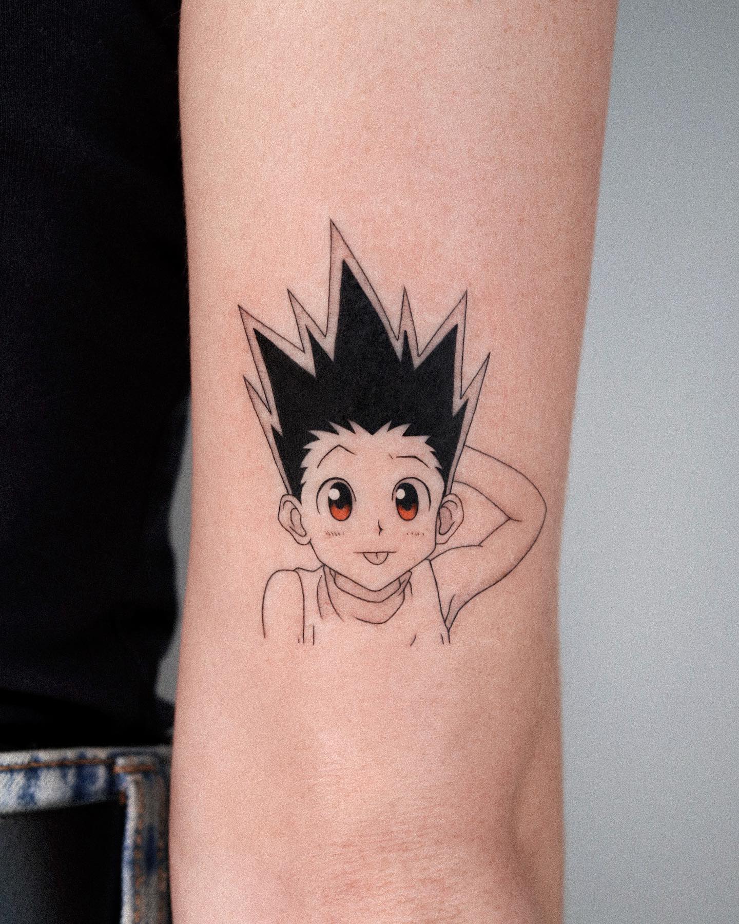 Tatuaje pequeño de Gon de Hunter X Hunter.