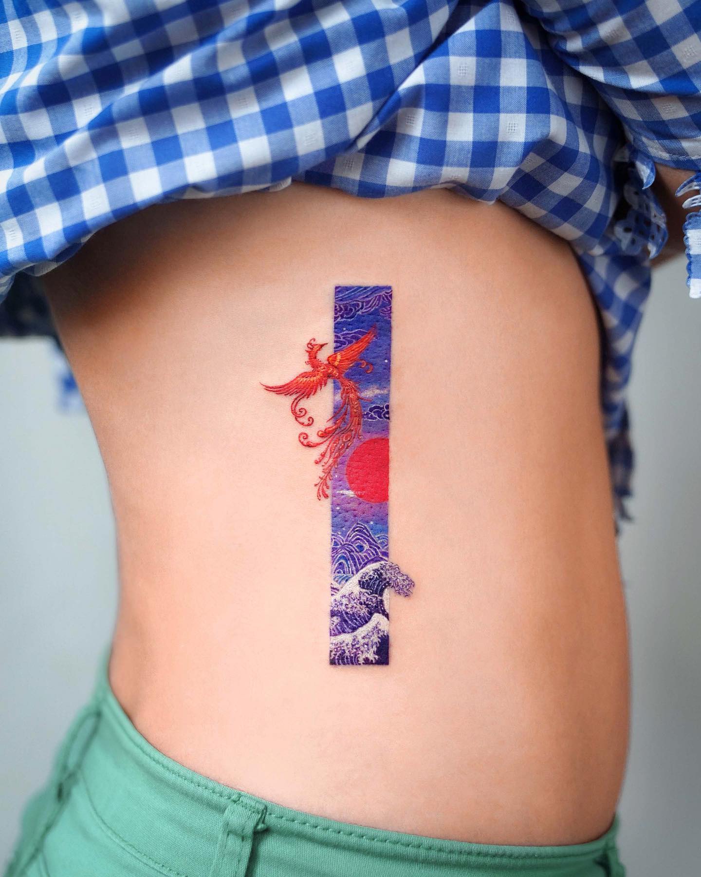 Tatuaje de costado de costilla de Fénix