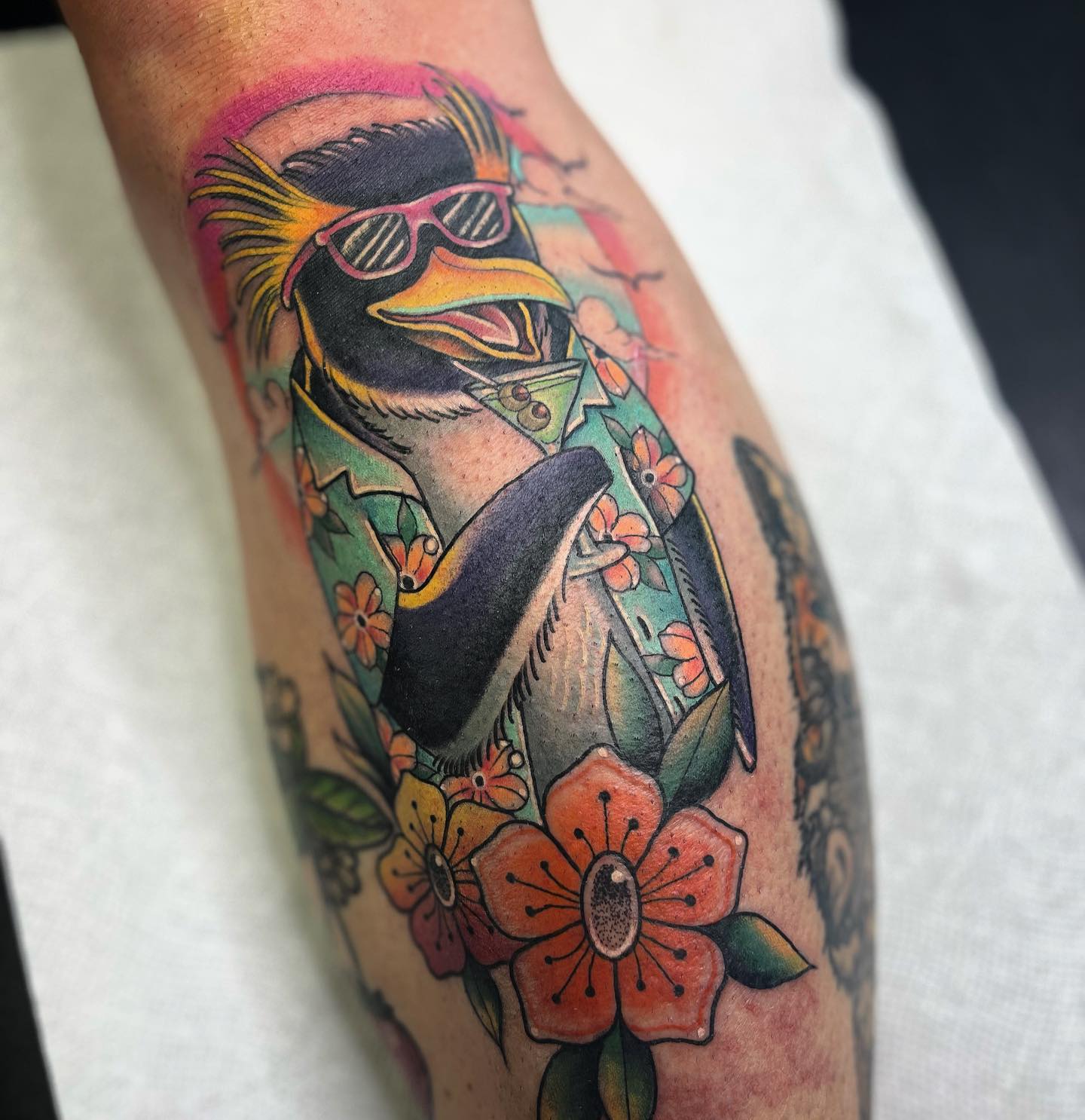 Tatuaje de pingüino colorido