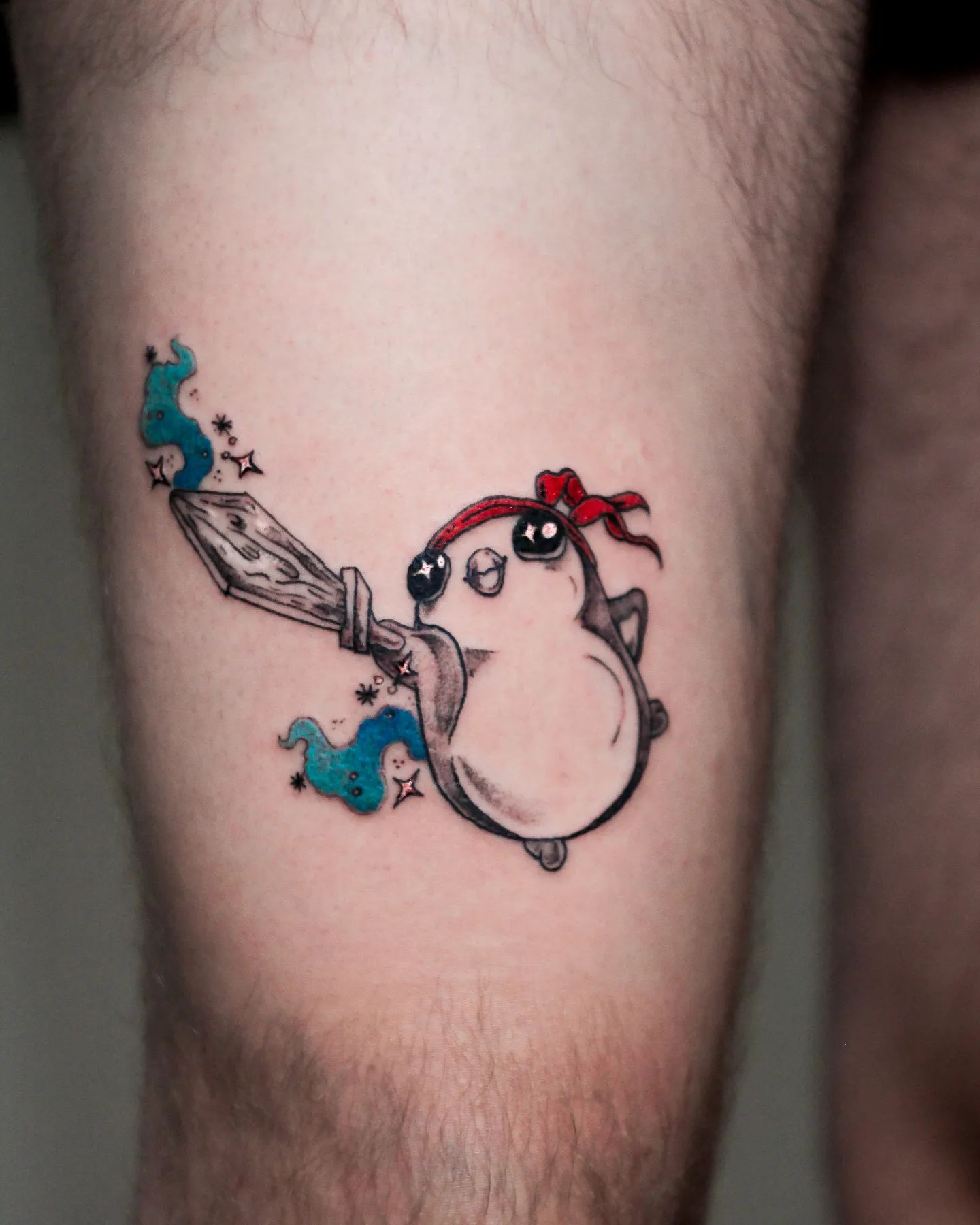 Tatuaje de pingüino guerrero