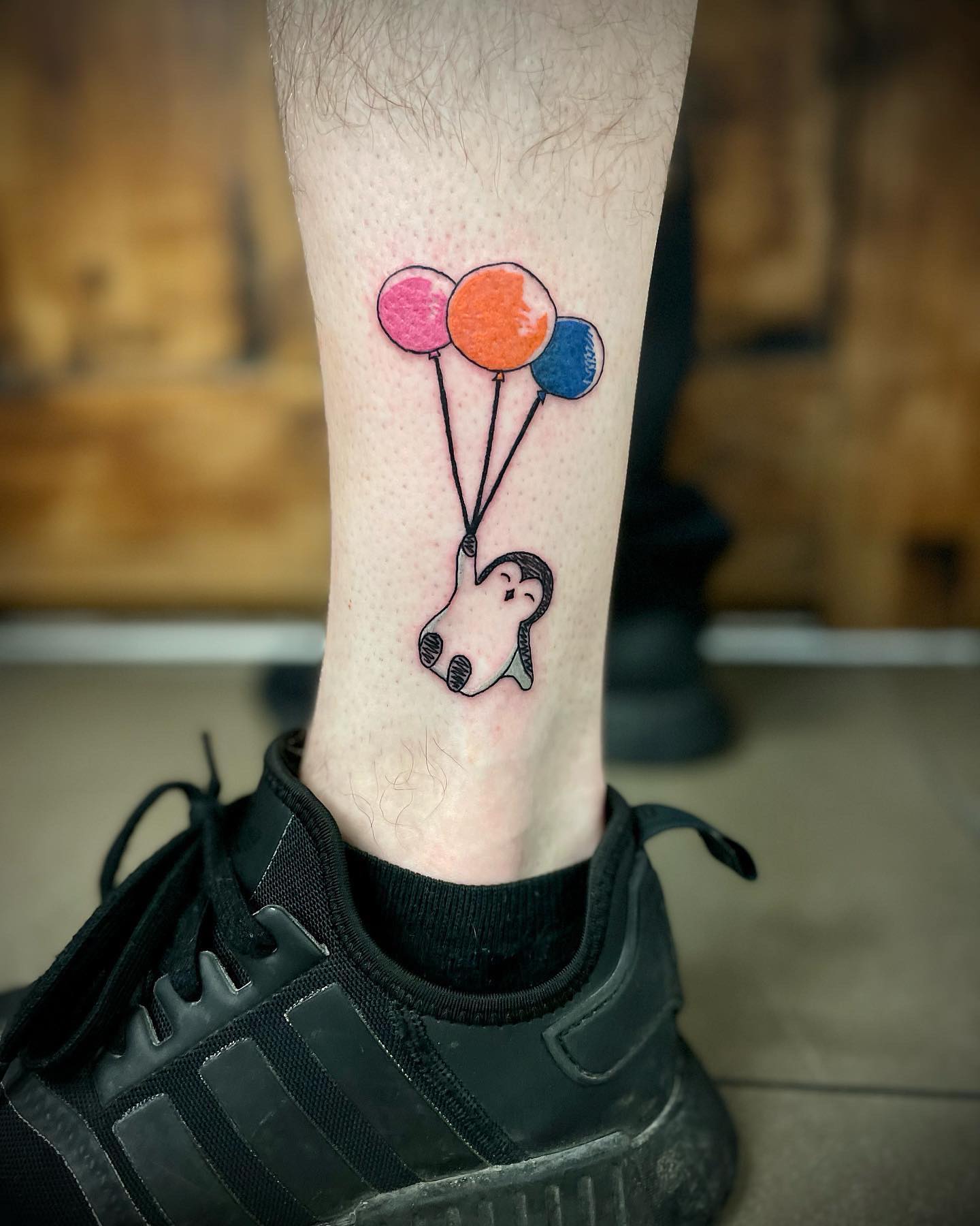 Tatuaje Feliz de Pingüino