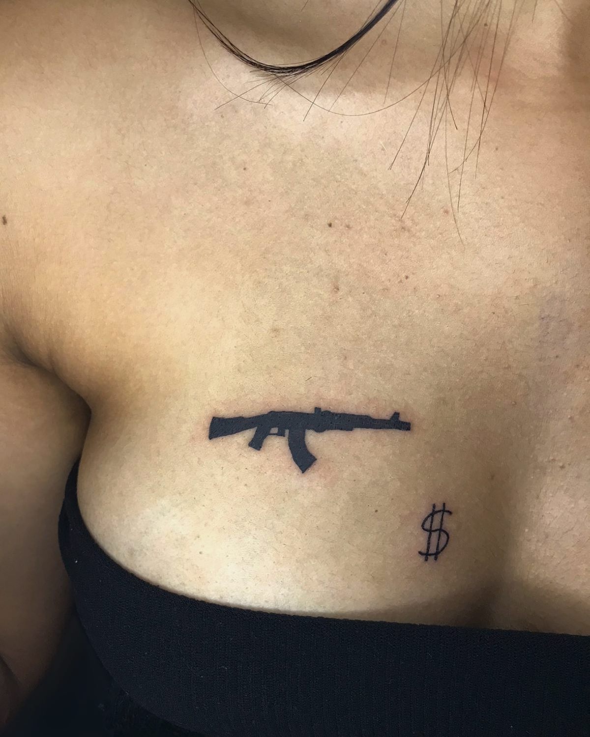 Boob AK-Tatuaje.