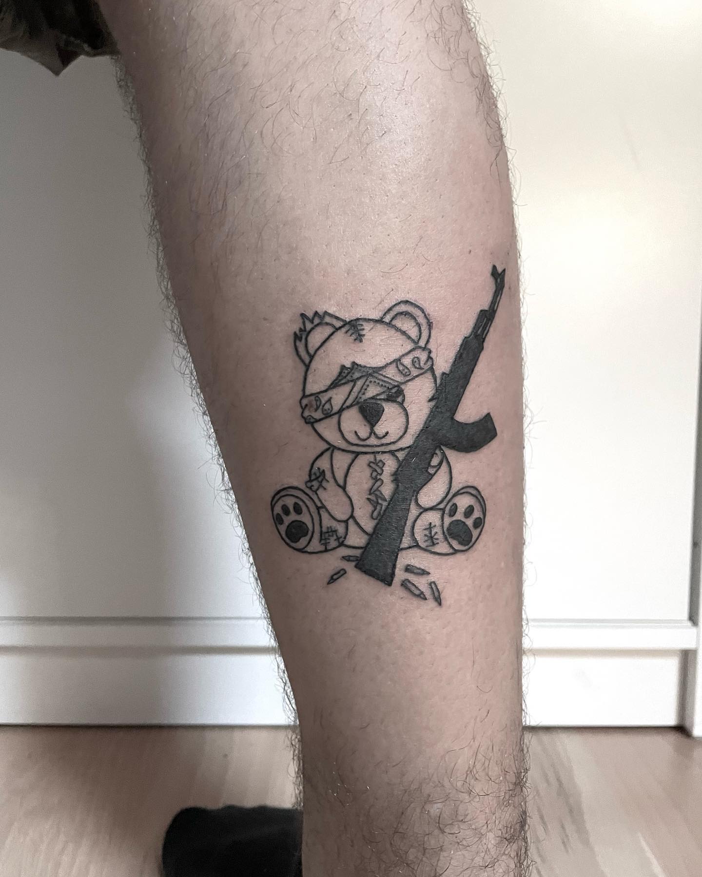 Divertido tatuaje AK