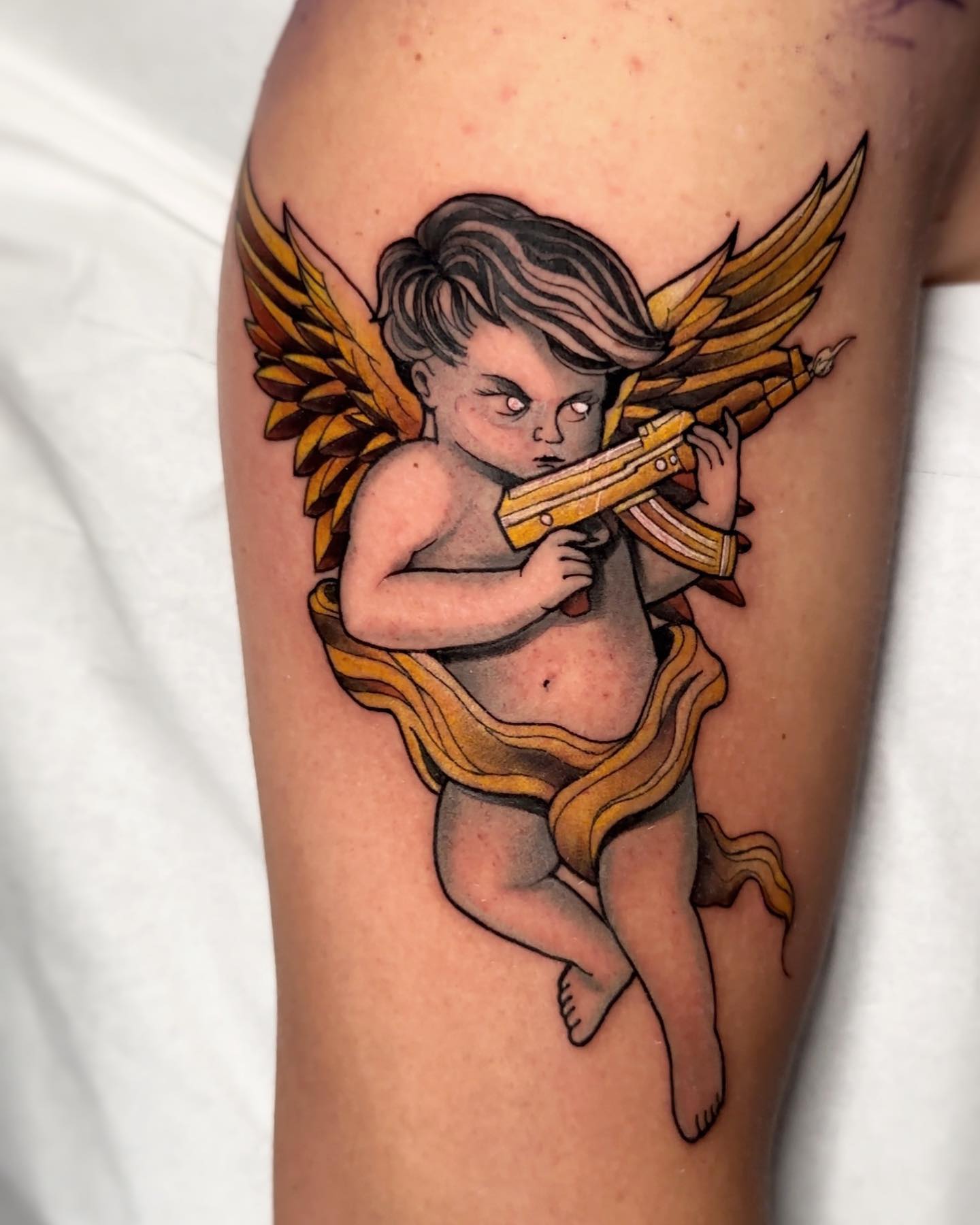 Tatuaje AK de Oro