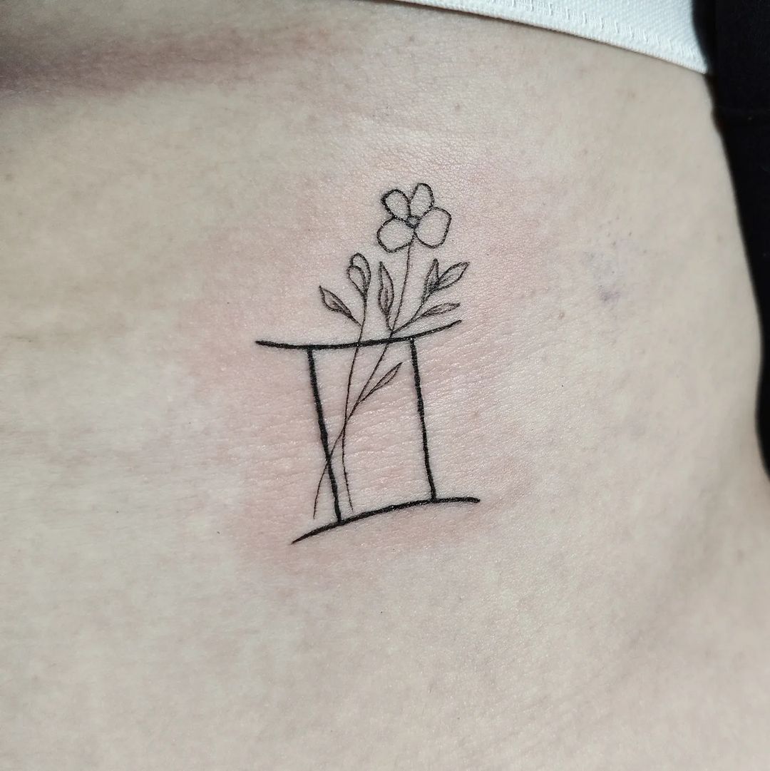 Tatuaje de Peces de Línea Artística
