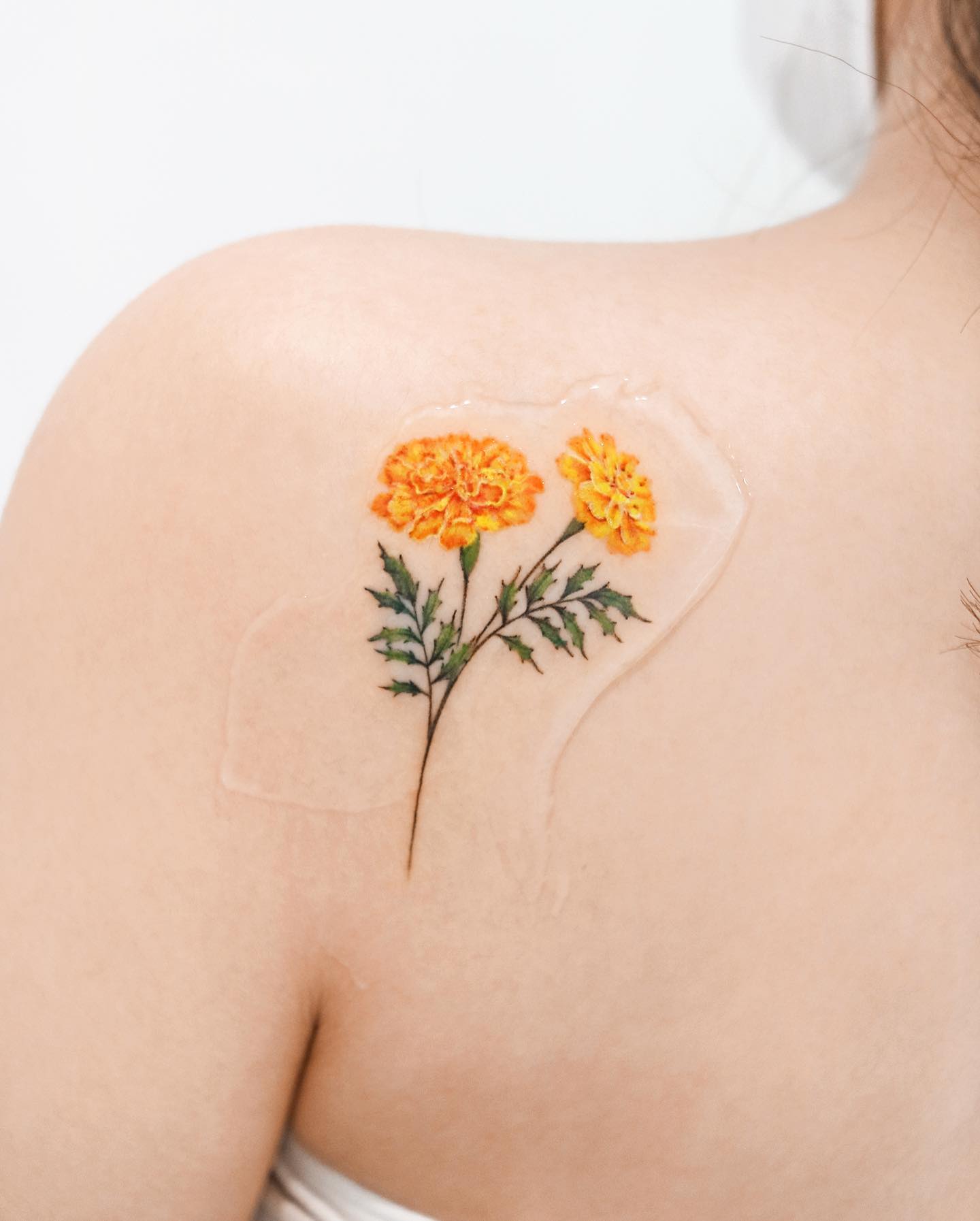 Tatuaje de Caléndula Femenina