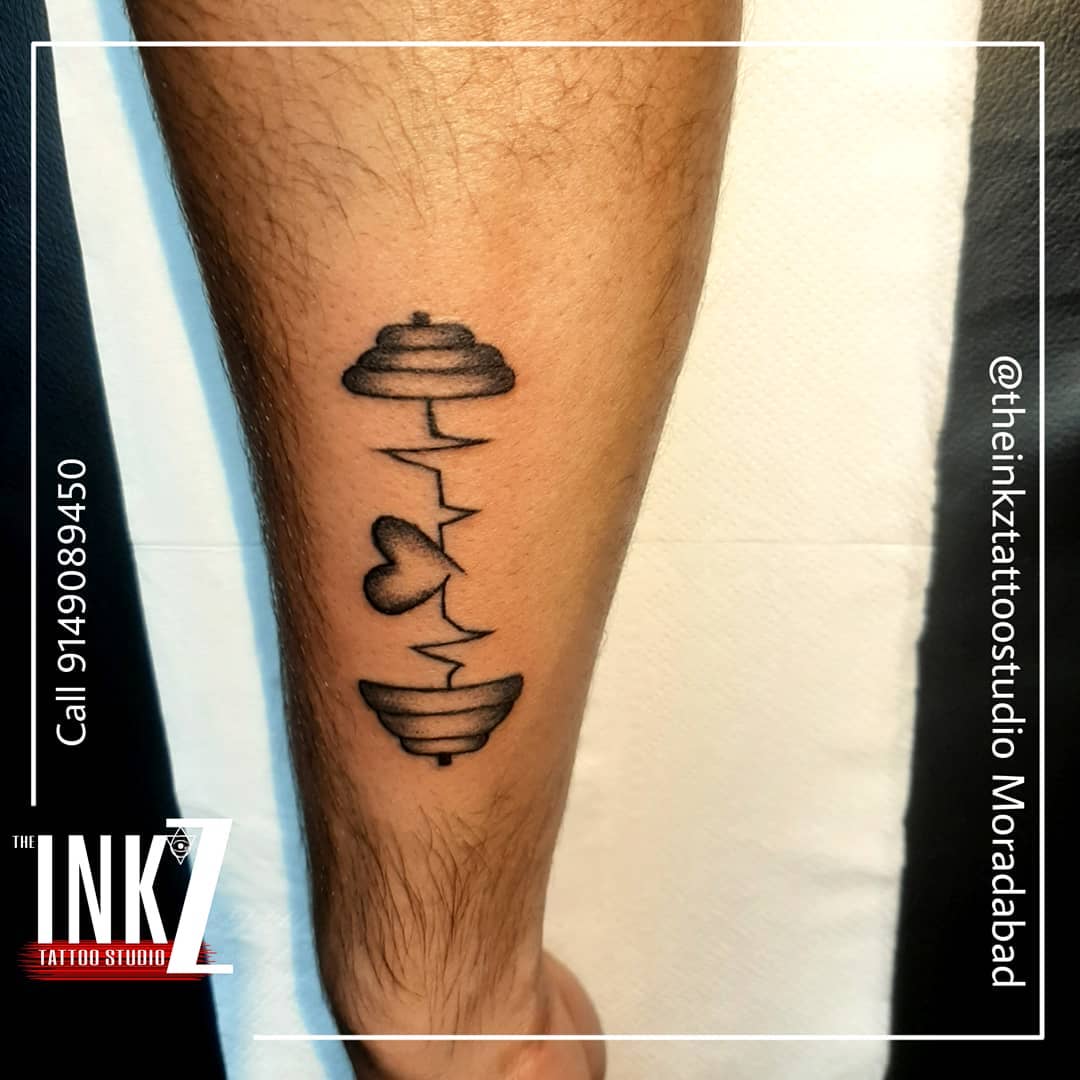Tatuaje de pesa para hombres