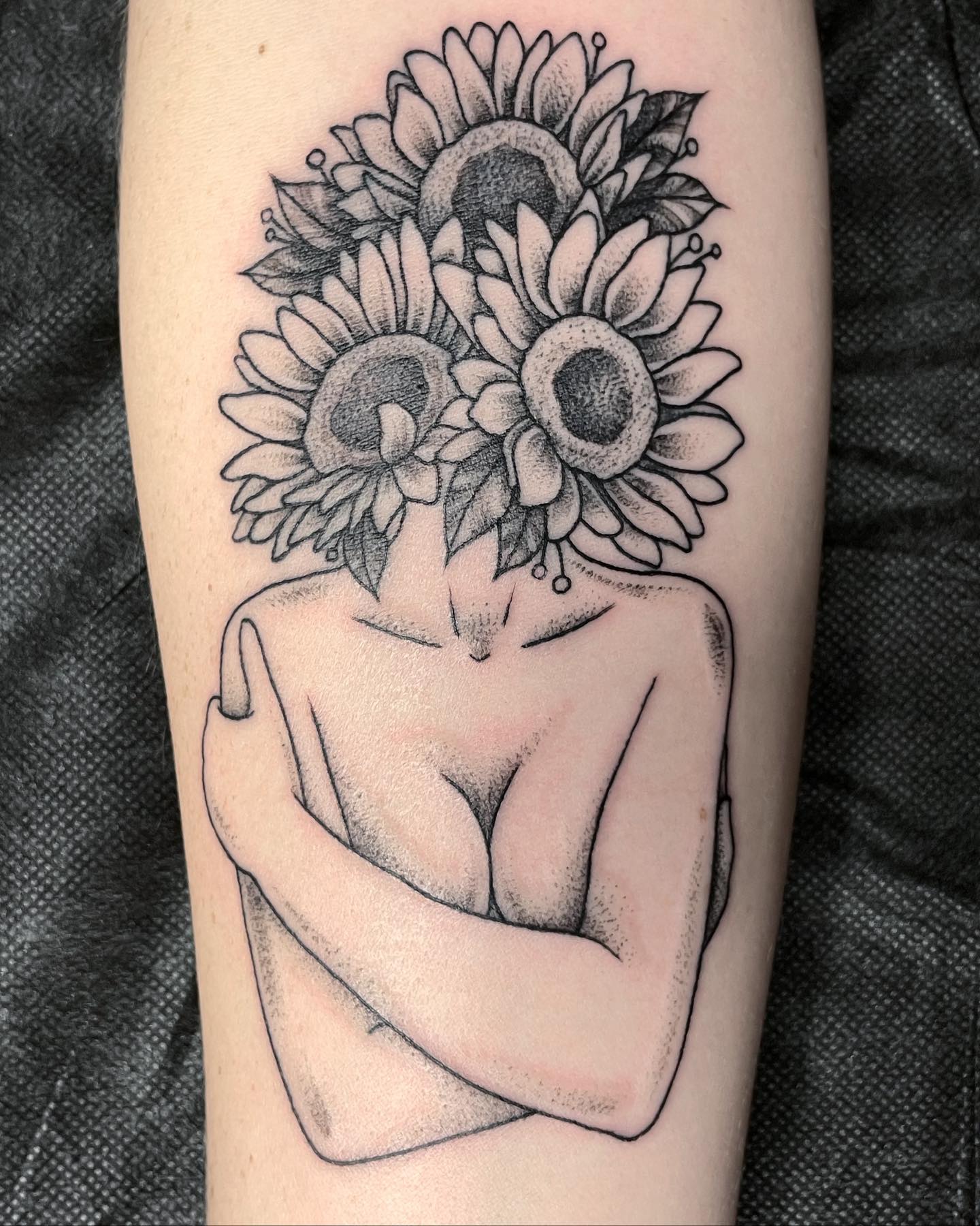 Tatuaje abstracto de girasol