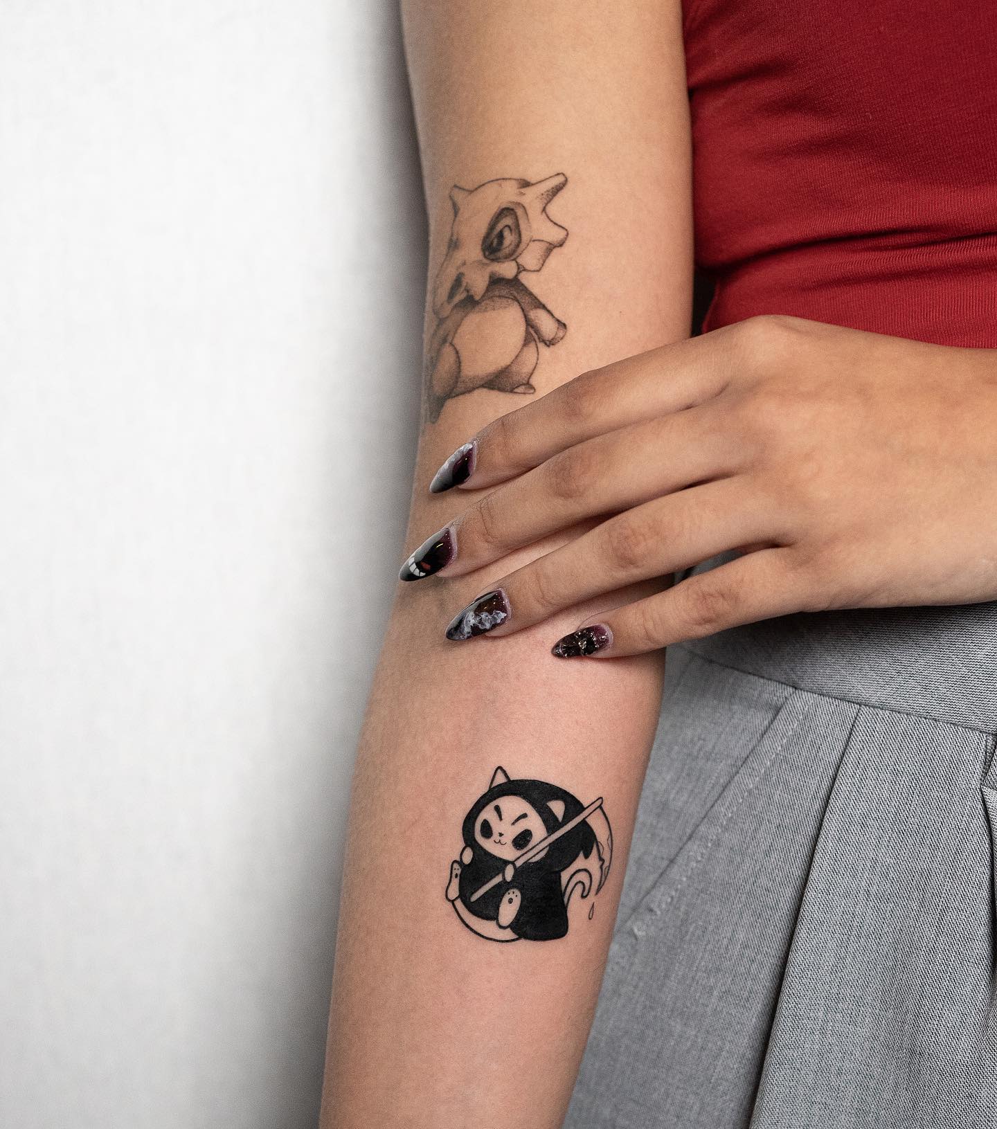 Tatuaje de la parca lindo y pequeño