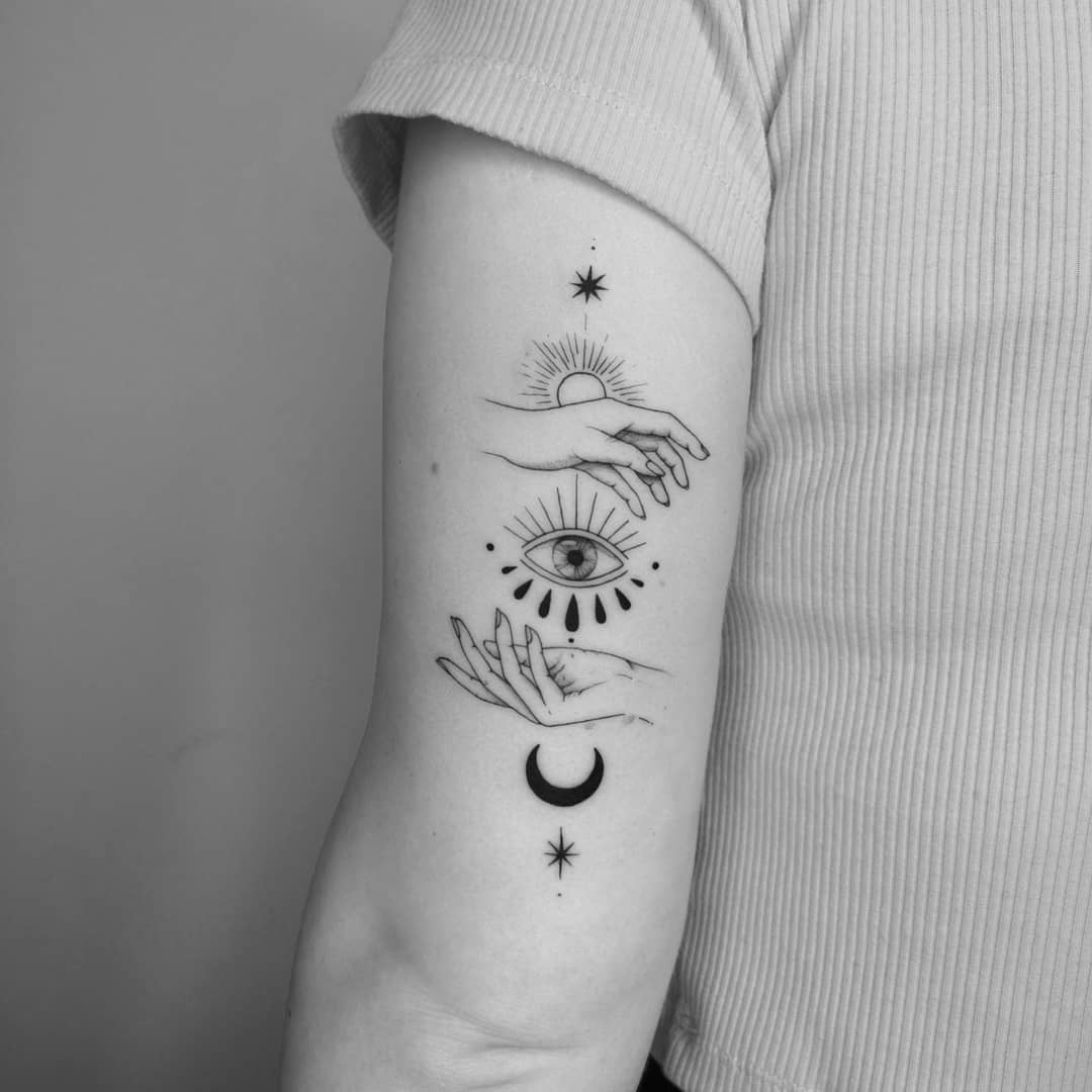 Tatuaje de Ojo Malvado en el Brazo.