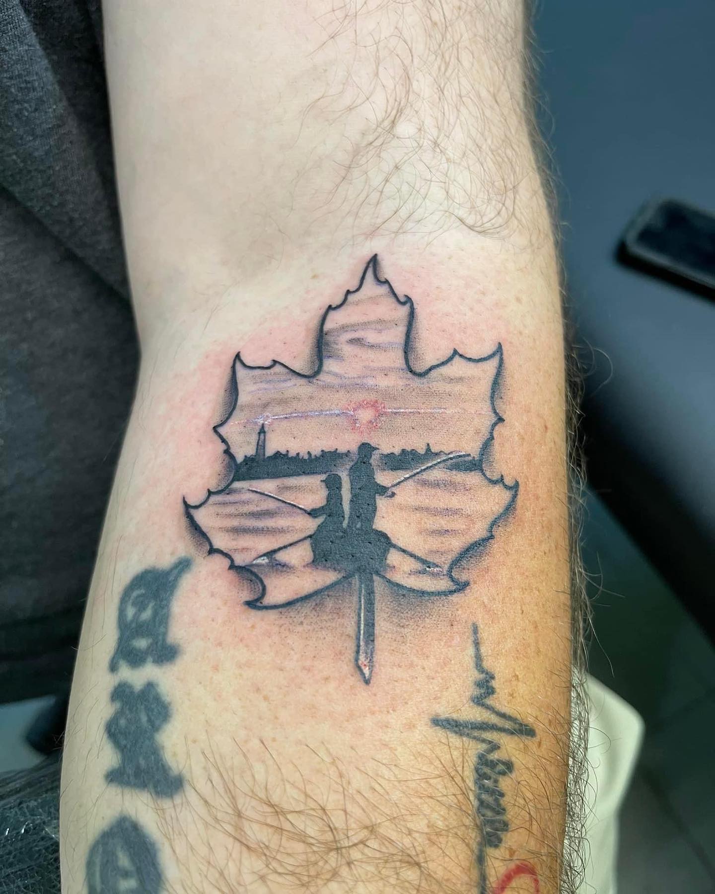 Padre e Hijo en Tatuaje de Hoja