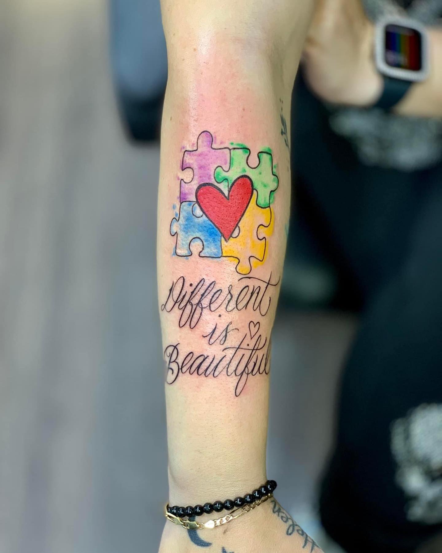 Rompecabezas colorido autismo tatuaje