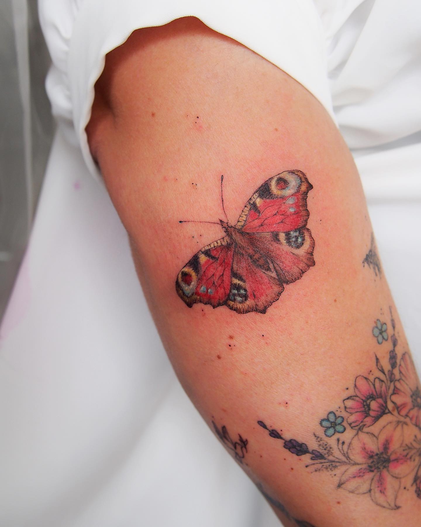 Tatuaje de mariposa realista