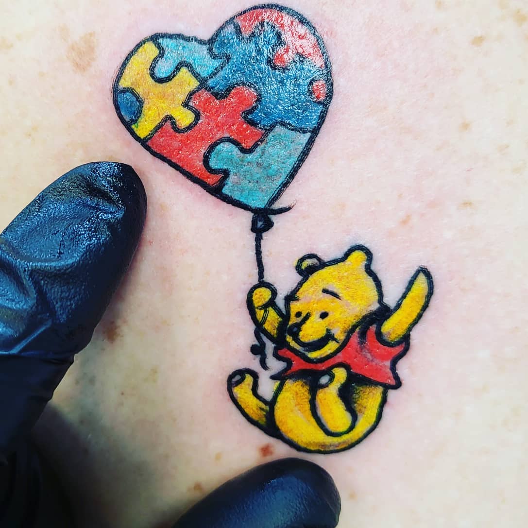 Winnie Autismo Tatuaje