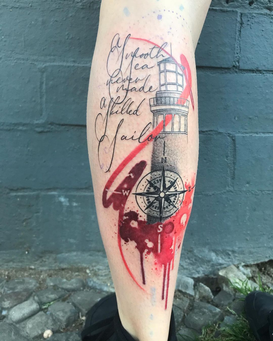 Combo de colores Rojo y Negro, tatuaje de Faro.