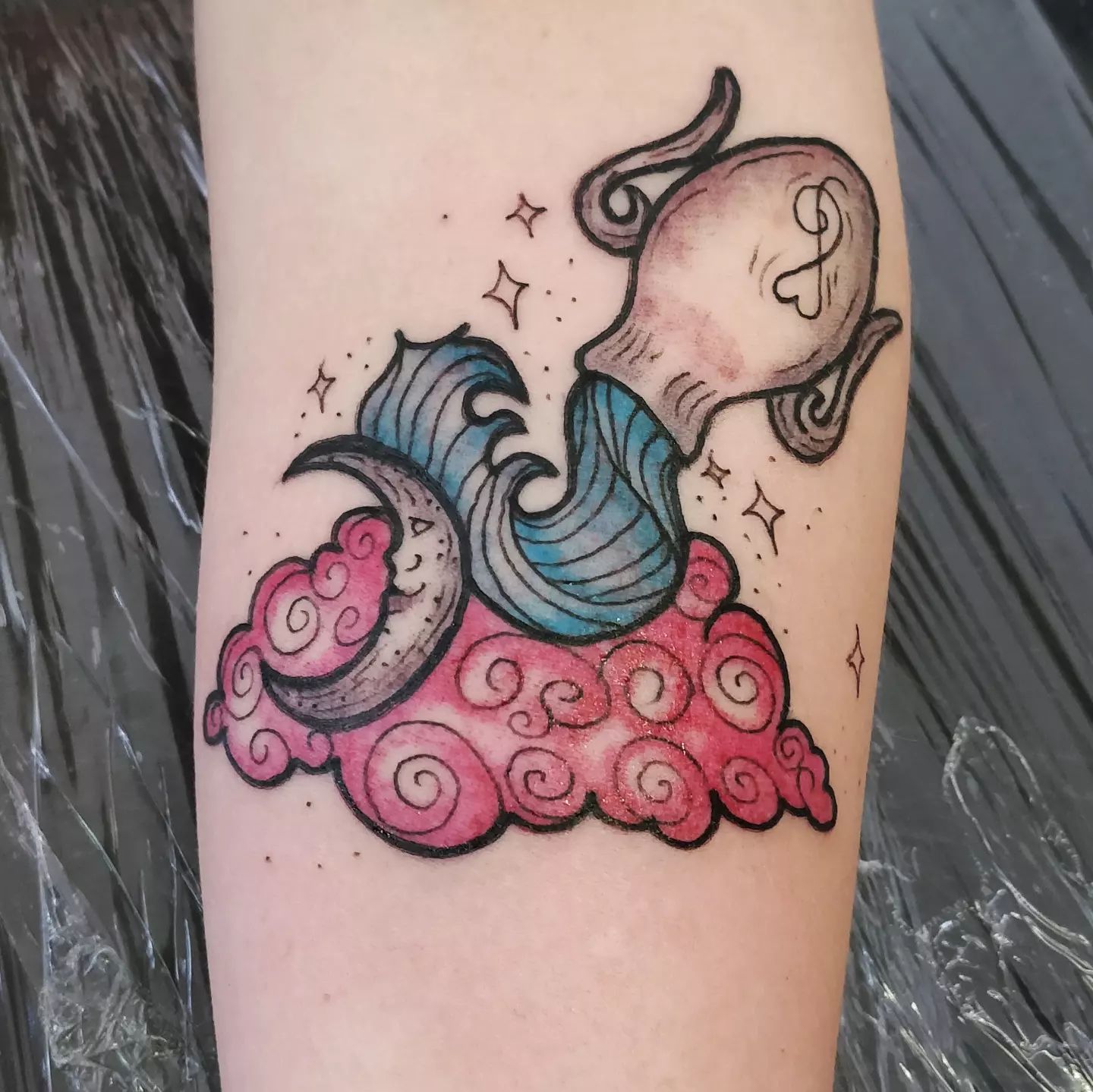 Tatuaje colorido de Acuario