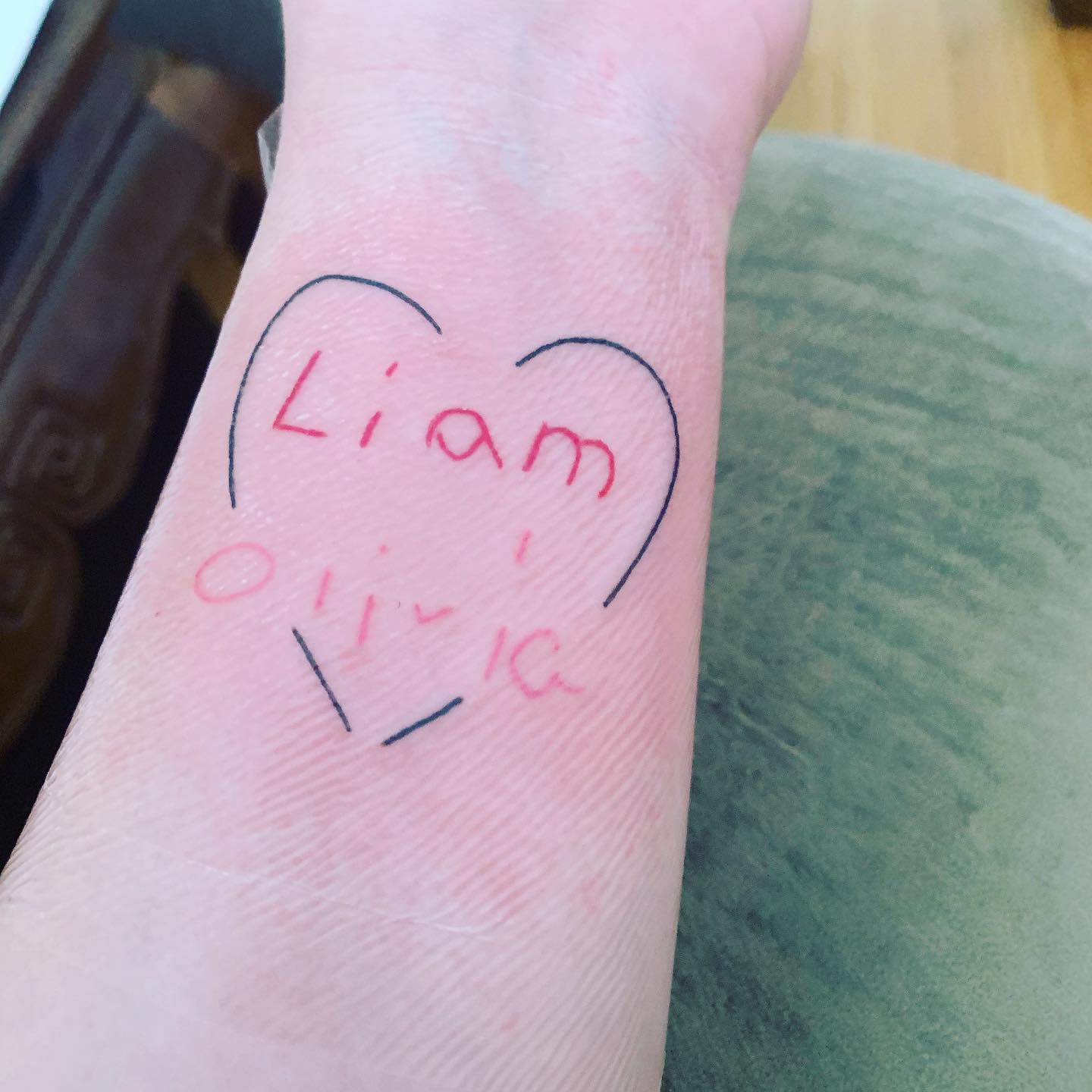 Tatuaje de nombre de dos niños