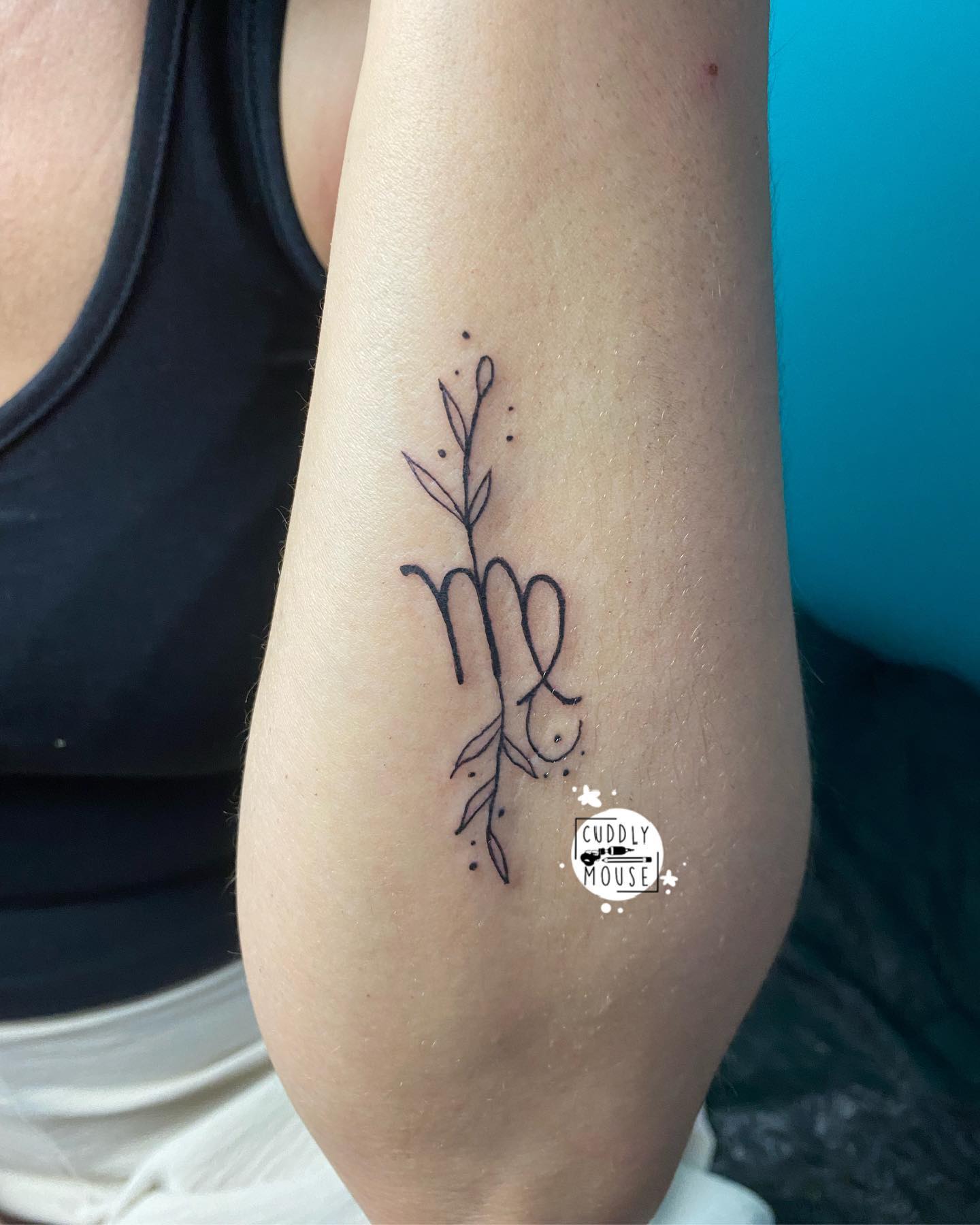 Tatuaje de Virgo en el antebrazo