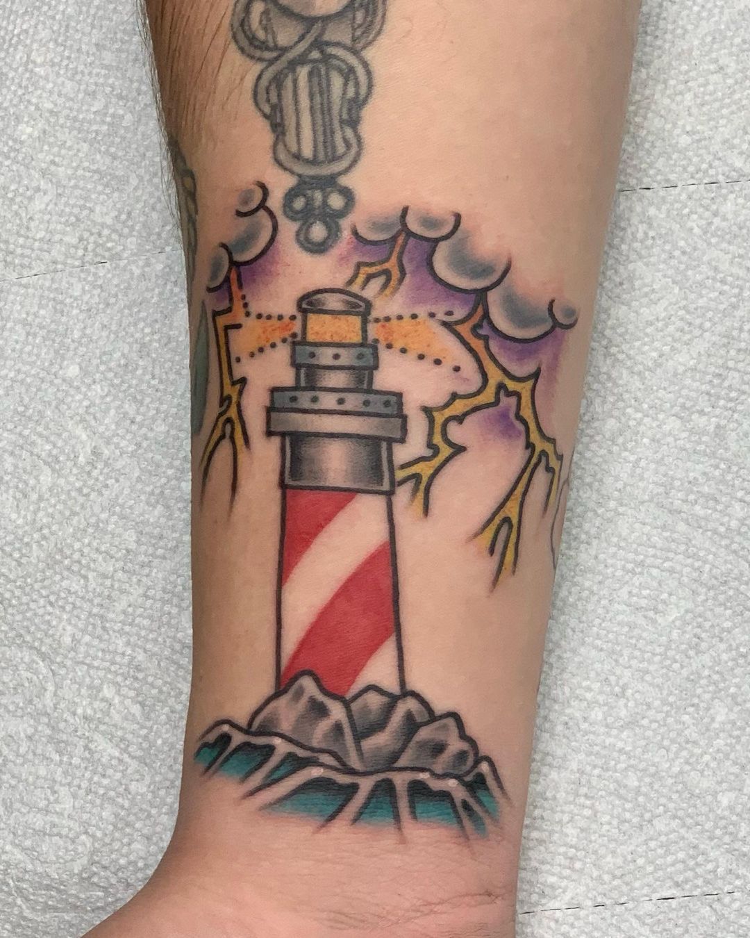 Tormenta Faro Tatuaje