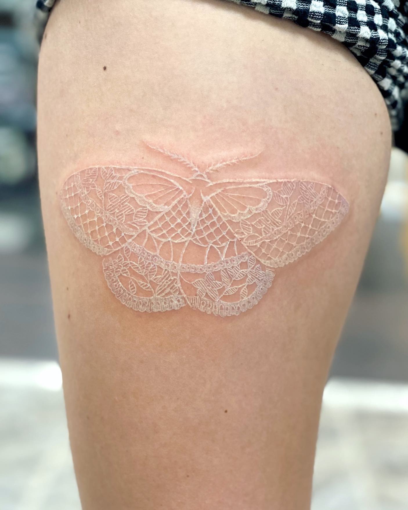Diseño de Mariposa de Encaje Blanco.