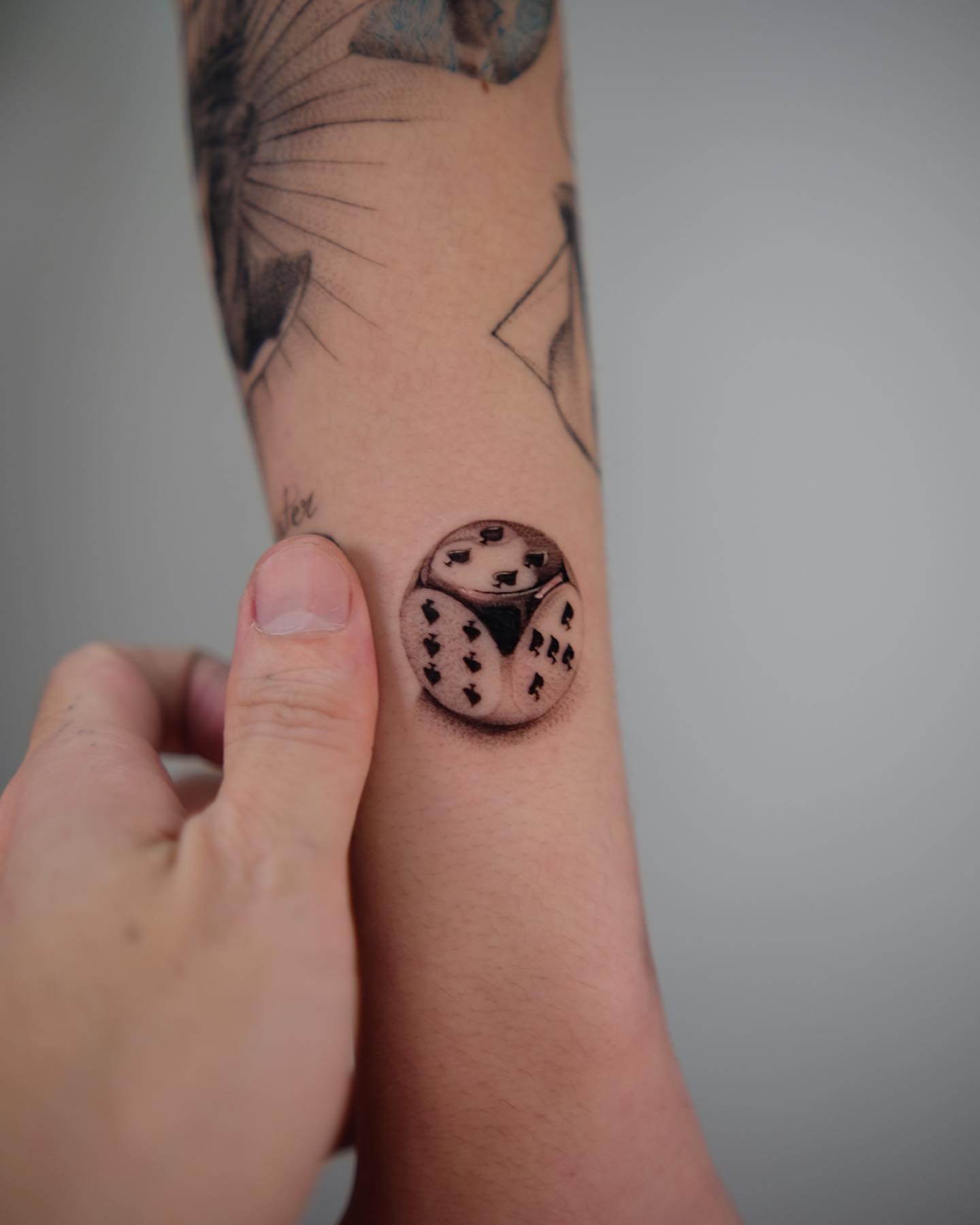 Pequeño tatuaje de dados