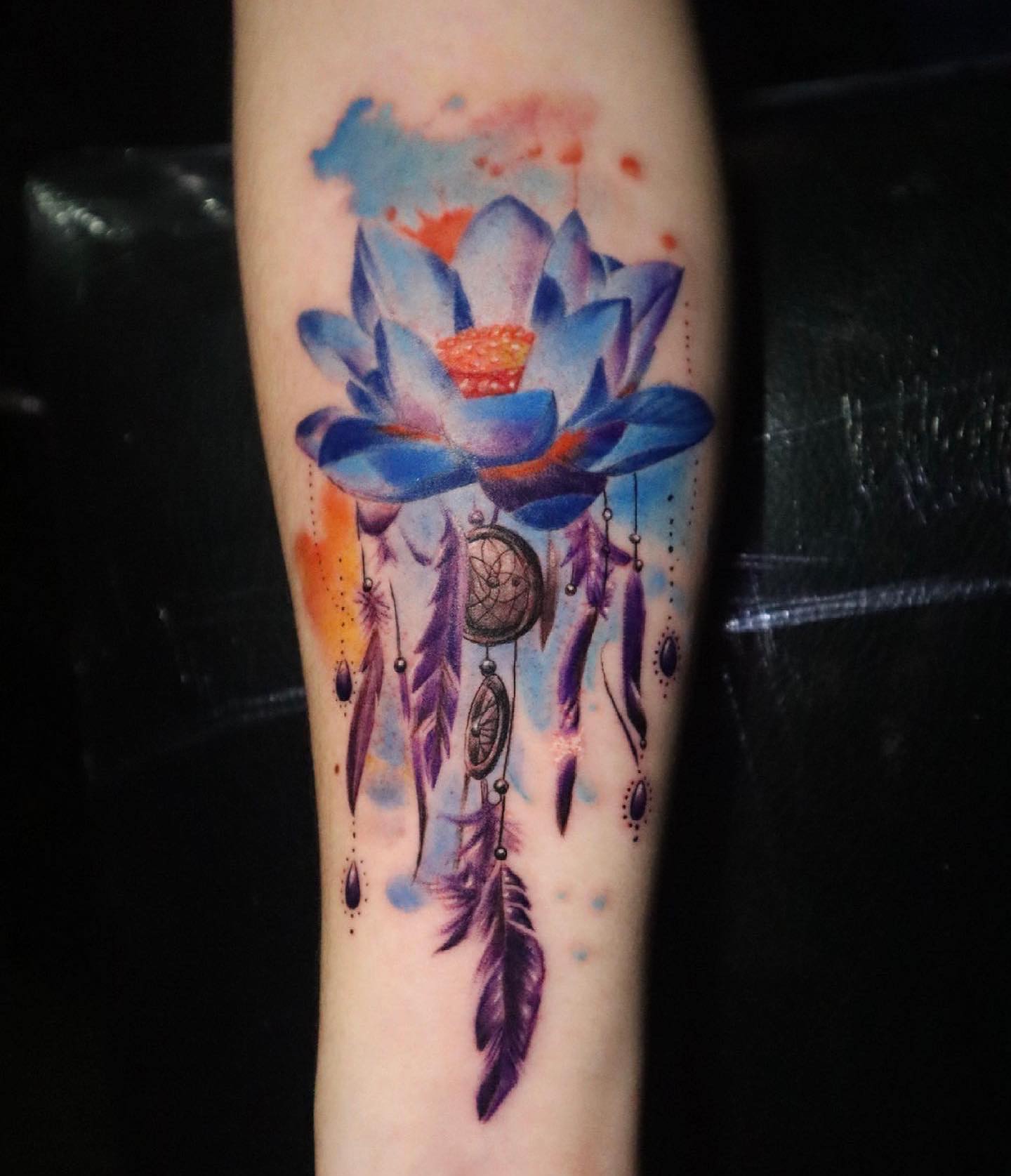 Tatuaje de loto y atrapasueños