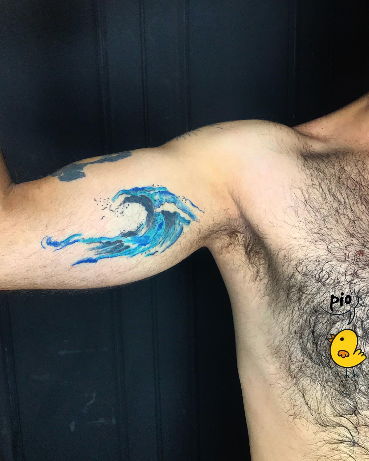 Tatuaje de Ola de Bíceps