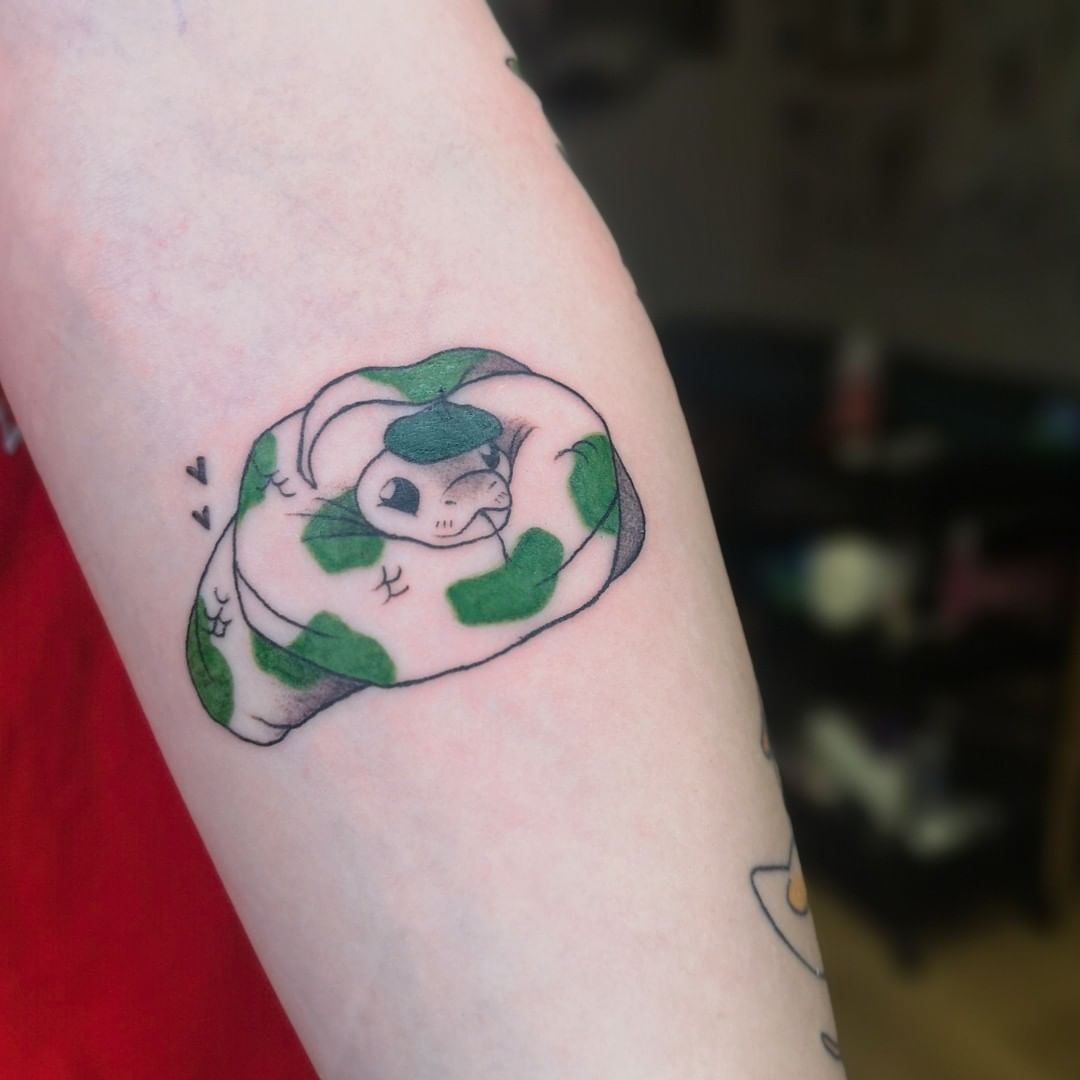 Tatuaje detallado de serpiente verde