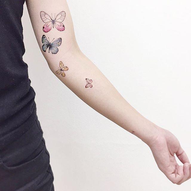 tatuaje brazo de mujer 371