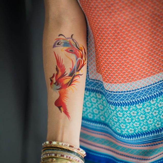 tatuaje brazo de mujer 711