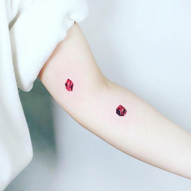 tatuaje brazo de mujer 911