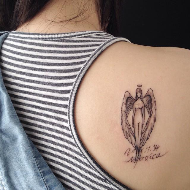 tatuaje espalda para mujer 111