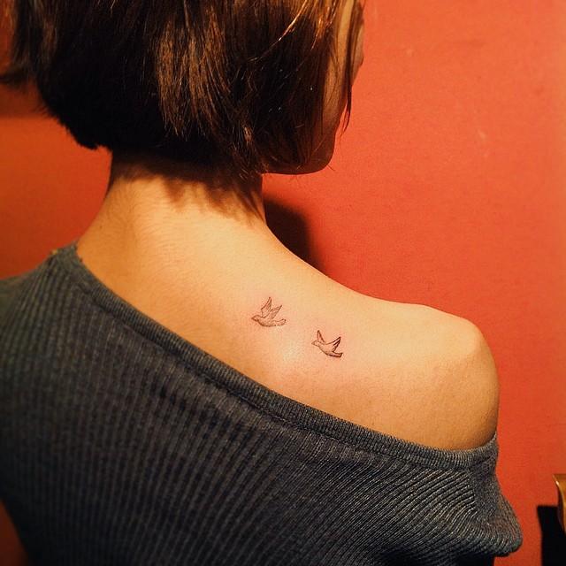 tatuaje espalda para mujer 681
