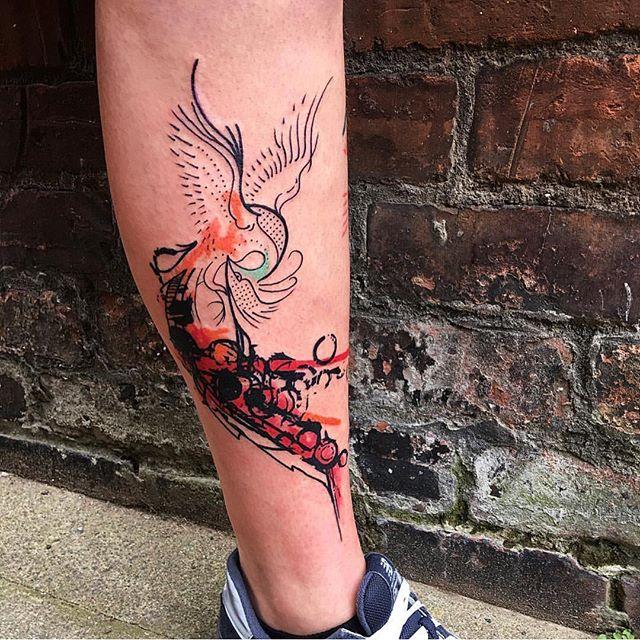 tatuaje hombre en la pierna 991