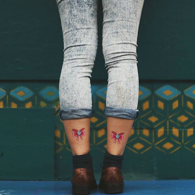 tatuaje mujer en la pierna 461