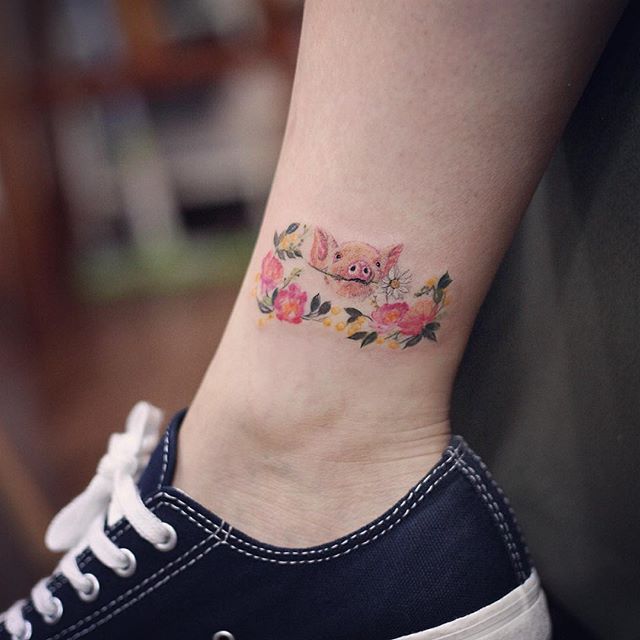 tatuaje mujer en la pierna 521