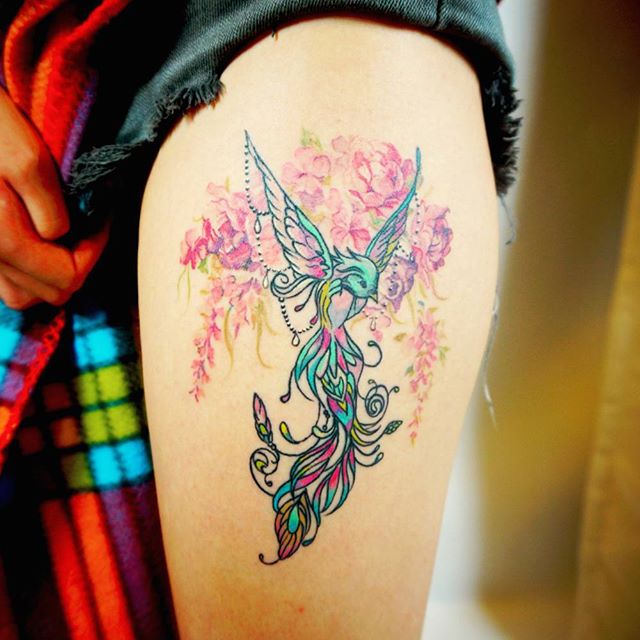 tatuaje mujer en la pierna 611