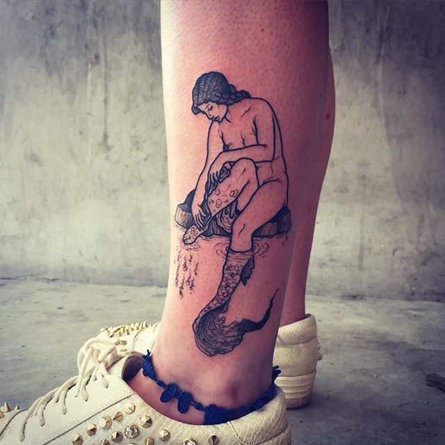 tatuaje mujer en la pierna 721