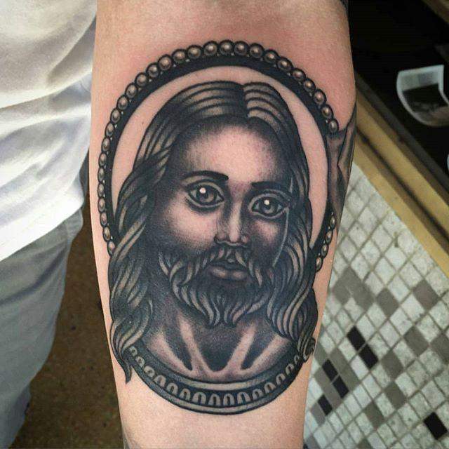 tatuaje jesus 141