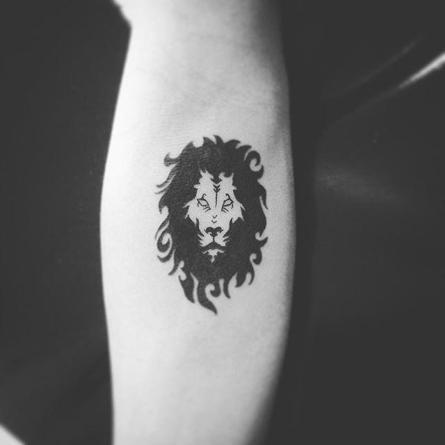 tatuaje leon 411