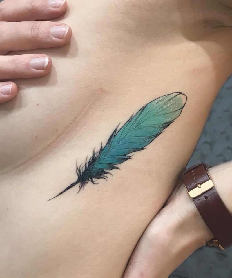 Un Tatuaje de pluma de este año Un Tatuaje de pluma de este año